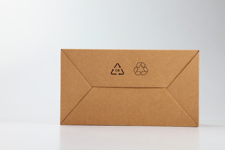 brown cardboard box on the plain backgroundの写真素材