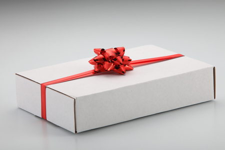 red ribbon on the white boxの写真素材
