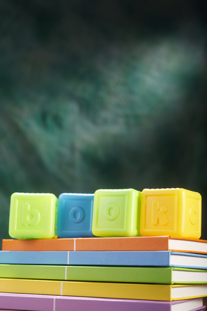 Blocks on a stack of booksの写真素材