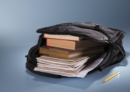 school bag fill up with bookの写真素材