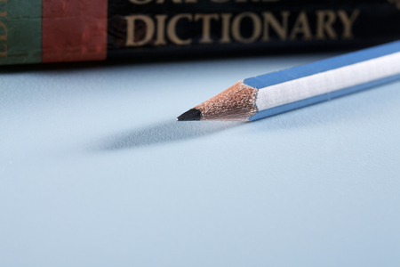 Pencil in front of the  dictionaryの写真素材