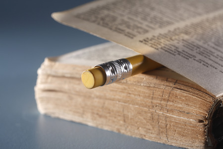Pencil as bookmark in a dictionaryの写真素材