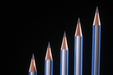 pencil form a graph on the dark backgroundの写真素材