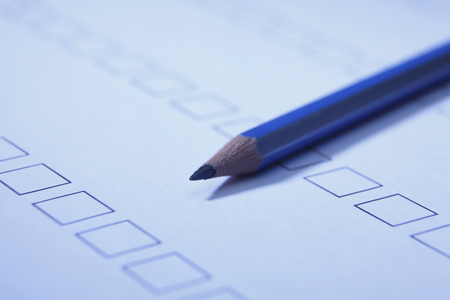 pencil on the survey formの写真素材