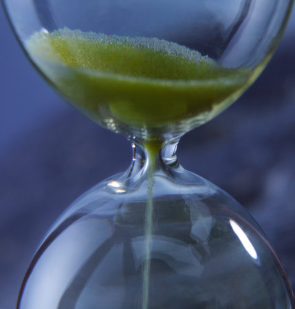 Hourglass - Grains of sand falling down