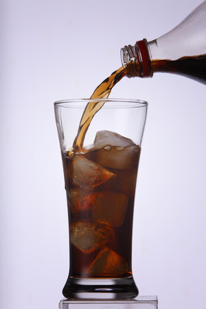 refreshener drink in a glass with ice blocksの写真素材