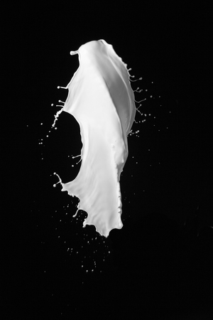 milk splash in the airの写真素材