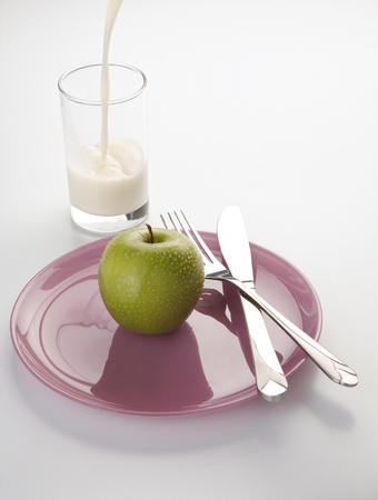 stock image of the measuring tape and appleの写真素材