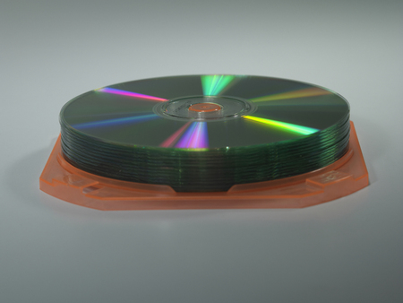 stack of the cd on the plain backgroundの写真素材