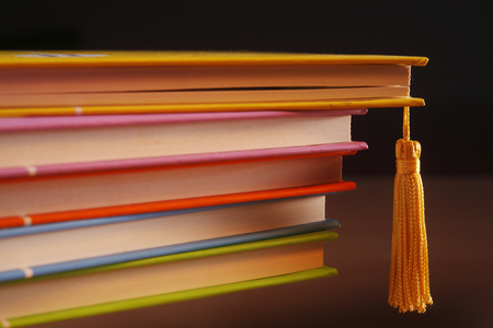 stack of books colourful hard cover with hanging tassleの写真素材