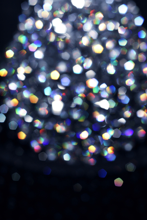 Silver-black defocused lights background.の写真素材