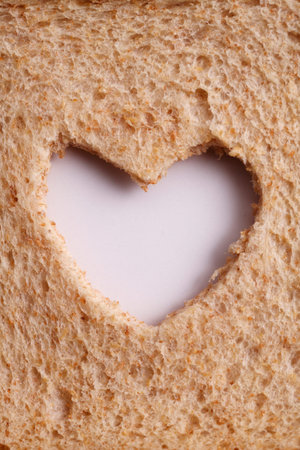 stock image of theslice of bread with heart shape