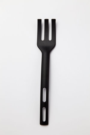 stock image of a large plastic fork.