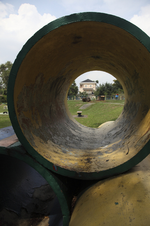 the worn out tunnel of playgroundの写真素材