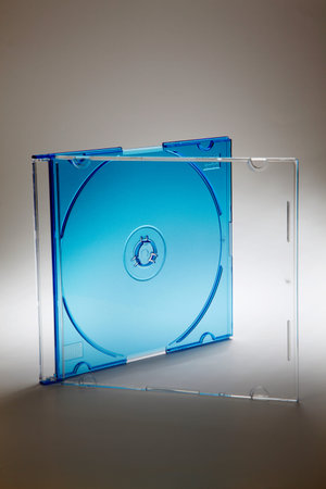 Studio shot of plastic CD or DVD case on lighting effect background