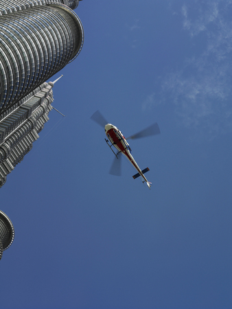 helicopter flight on a skyscraper backgroundのeditorial素材