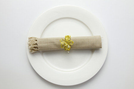 stock image of  rolled napkin and holderの写真素材