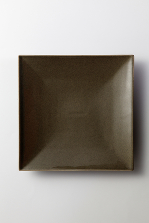 Clean white dinner plate with drop shadowの写真素材