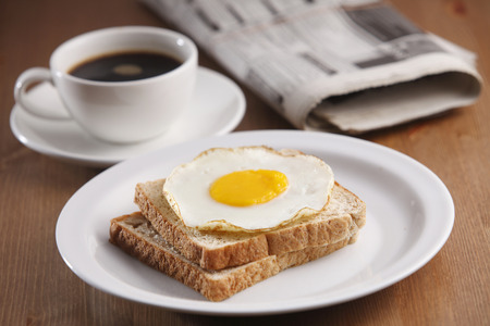 stock image of the breakfast and newspaperの写真素材