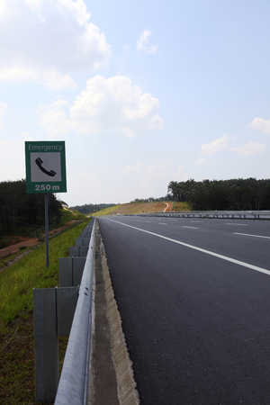 Lorry driving past emergency signの写真素材