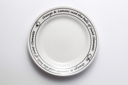 Clean white dinner plate with drop shadowの写真素材