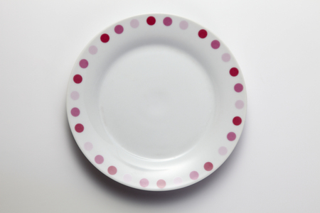 Clean white dinner plate with drop shadowの写真素材