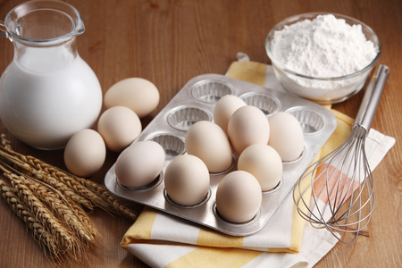 Top view of baking ingredients and whisk.の写真素材