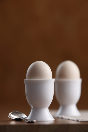 Stock image of eggs in egg cups.の写真素材