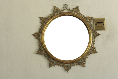 Gold vintage metal frame on wallの写真素材