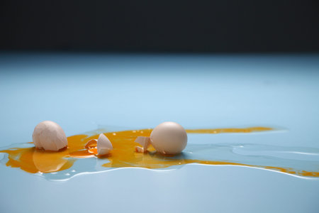 Egg yolk and egg white splattered.