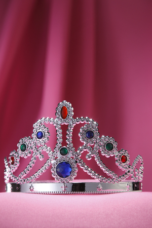 Tiara with a pink cloth as background.の写真素材