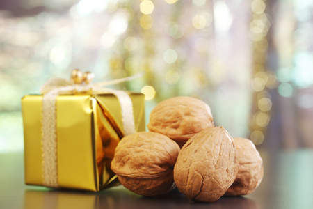 Present box with some walnuts.の写真素材