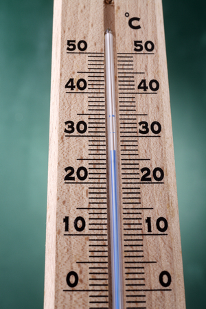 Room thermometer on the background.の写真素材