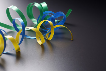 Curled ribbons isolated on the background.の写真素材