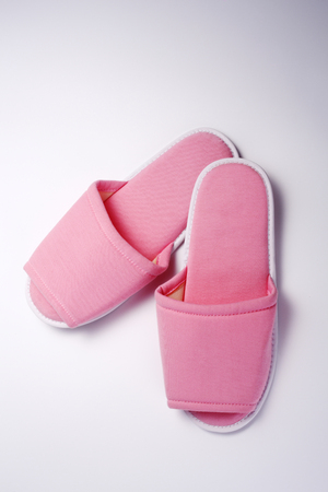 Pink slippers isolated on the white background.の写真素材