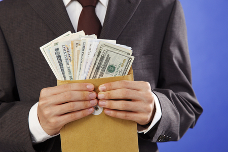 man received money in the envelopeの写真素材