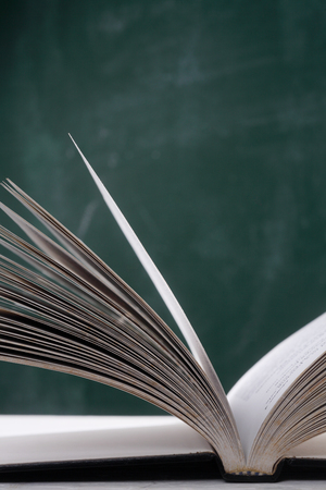 close up of the open book at classroomの写真素材