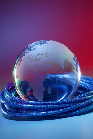glass globe on the network cableの写真素材