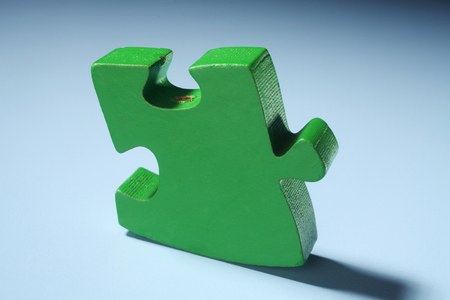 close up of the green puzzle pieceの写真素材