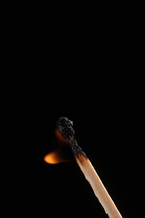 Match ignited on the blackの写真素材