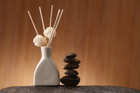 Sticks of incense in ceramic jarの写真素材