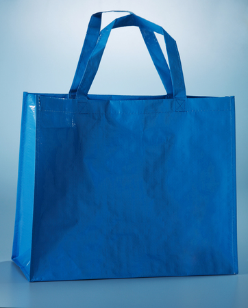Blue recycle bag on blue backgroundの写真素材