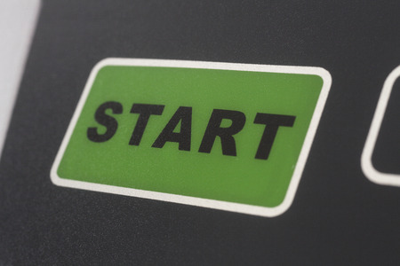 green button with the word STARTの写真素材