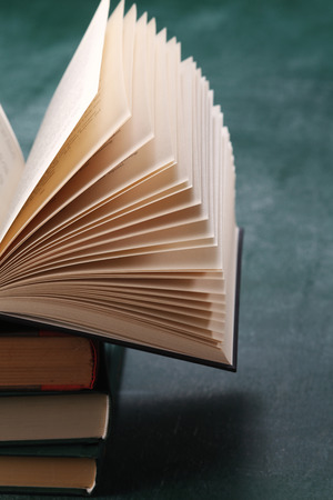 Open book with green backgroundの写真素材