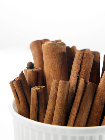 Cinnamon sticks on a white background