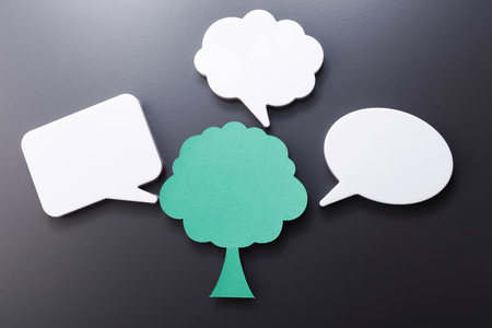 speech bubble and paper treeの写真素材