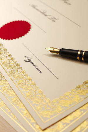 close up of the pen and certificateの写真素材