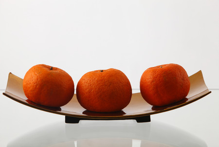 the mandrin oranges in a rowの写真素材