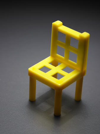 close up of the yellow toy chairの写真素材