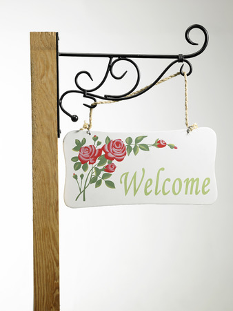 welcome wooden signage on the poleの写真素材